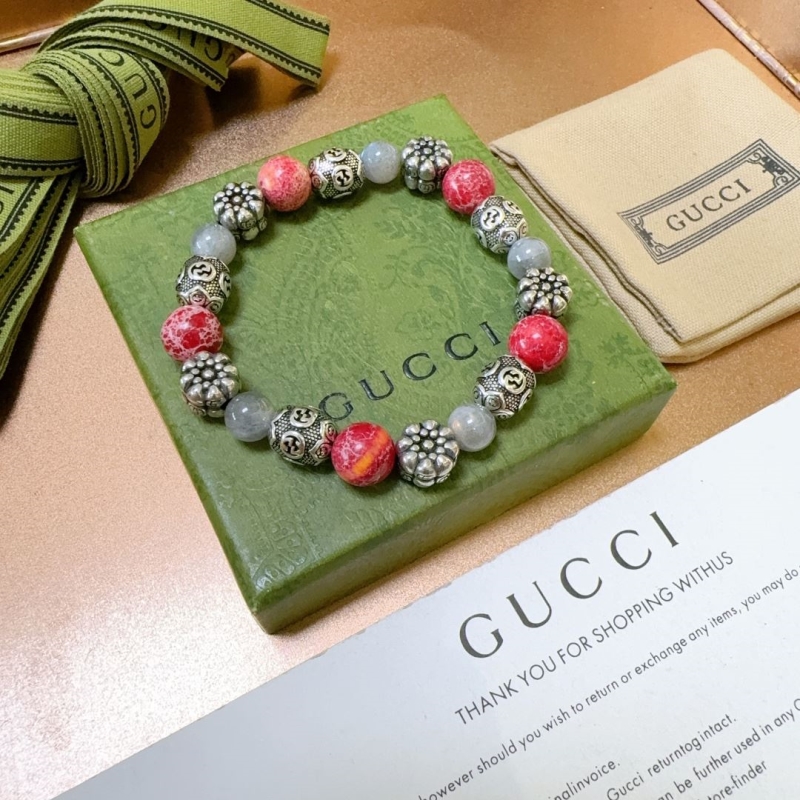 G*u*i bracelets